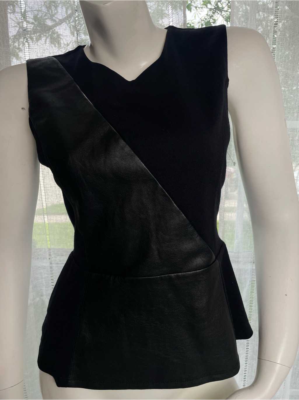 Bcbgmaxazria Black Sleeveless Peplum Top With Diagonal Leather Panel